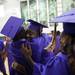 Ypsilanti graduates embrace after commencement on Tuesday, June 4. This is the 164th and final graduating class. Daniel Brenner I AnnArbor.com